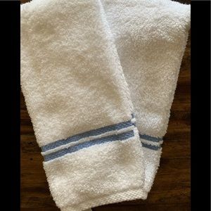 Set of two white terry cloth, with blue embroidered stitching, HAND TOWELS.